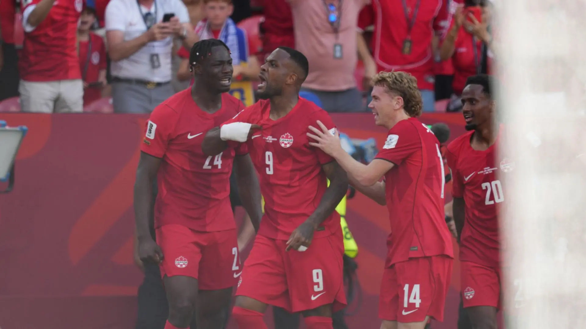 Canada rescue draw against Bosnia to claim first World Cup point